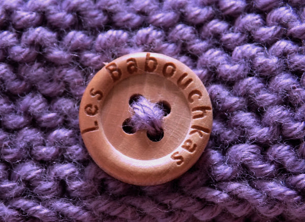 Chaussons bébé laine mérinos et coton biologique tricoté à la main en France.